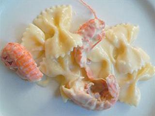 Langoustine butterfly pasta in a white roux sauce Langoustine butterfly pasta in a white roux sauce