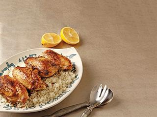 Grilled chicken breasts in a cast-iron pot