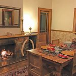 Six of the seven chalets are located near the main house, which has a communal kitchen and dining room for guest use.