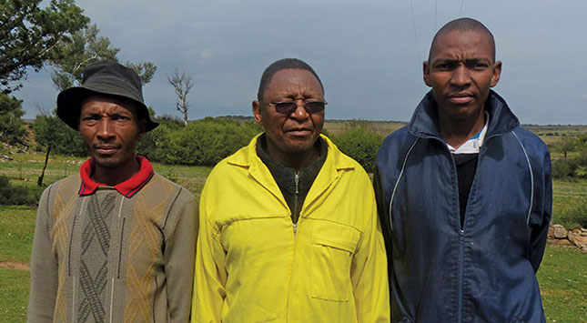 Lawrence Maduna (centre) and his two sons Zolani (left) and Zukile (right). ‘We were interested in the farming business more than anything else,’ says Zukile about their decision to join the family farming business.