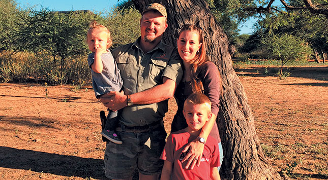 Jacques van der Westhuizen holding daughter Mia, and wife Renadie with son Barend. 