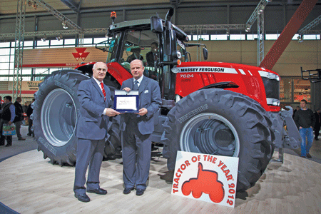 Richard Markwell and Massey Ferguson's CEO Martin Richenhagen with the Tractor of the Year and Milestones awards.
